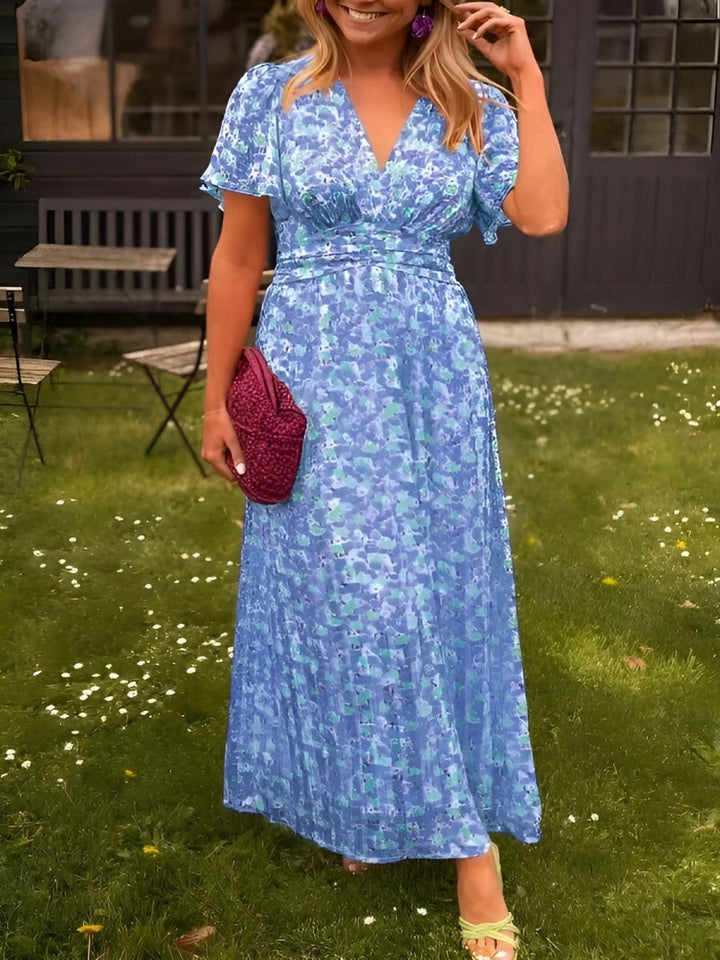 Sandra – Narančasta Cvjetna Maxi Haljina